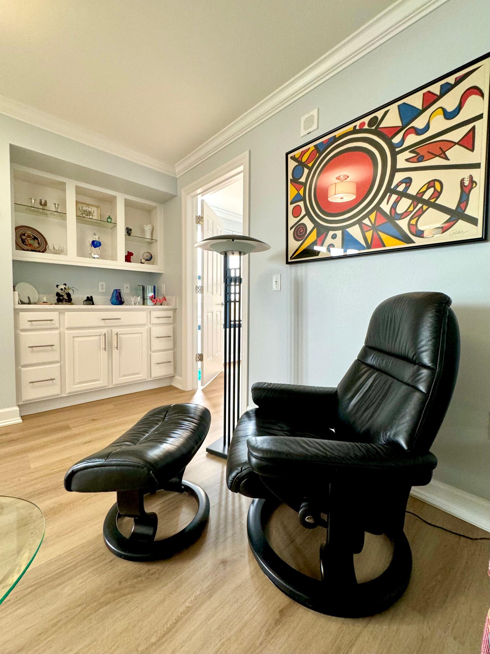 A living room chair in a Capitol Lakes floor plan.