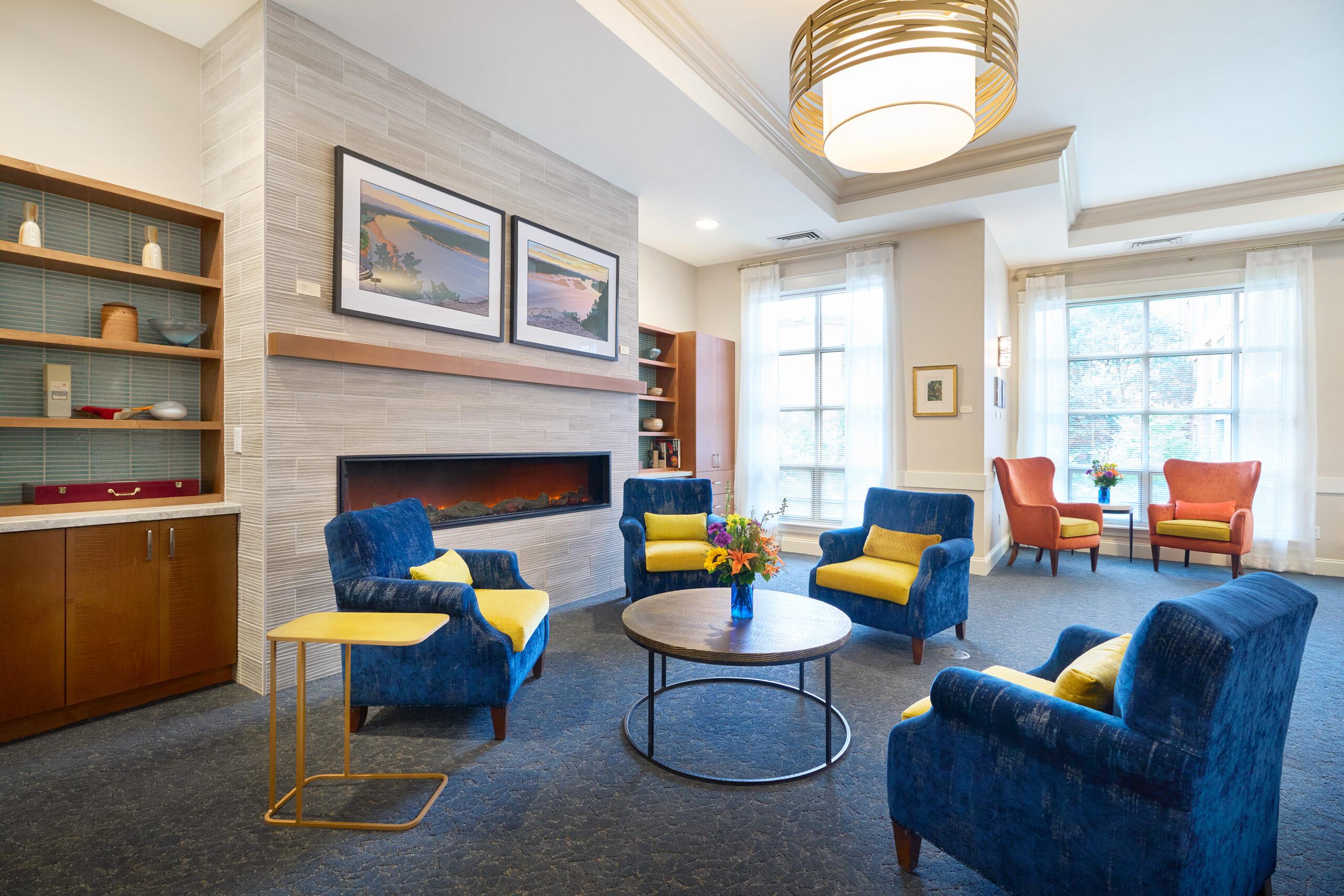 A gathering area in Capitol Lakes with chairs and a table.