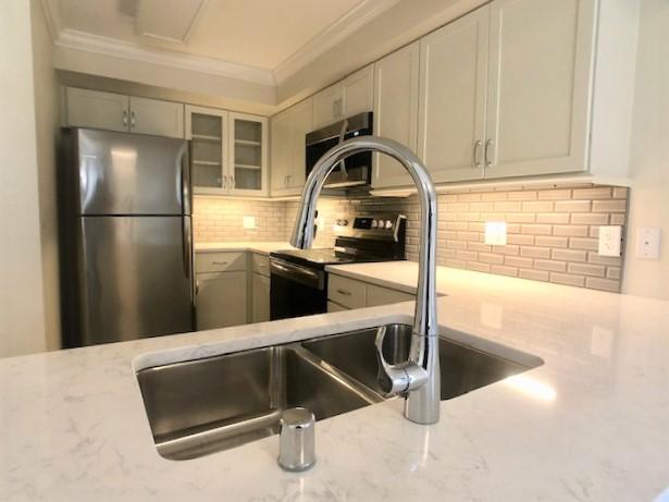 A kitchen in the Heights floor plan.